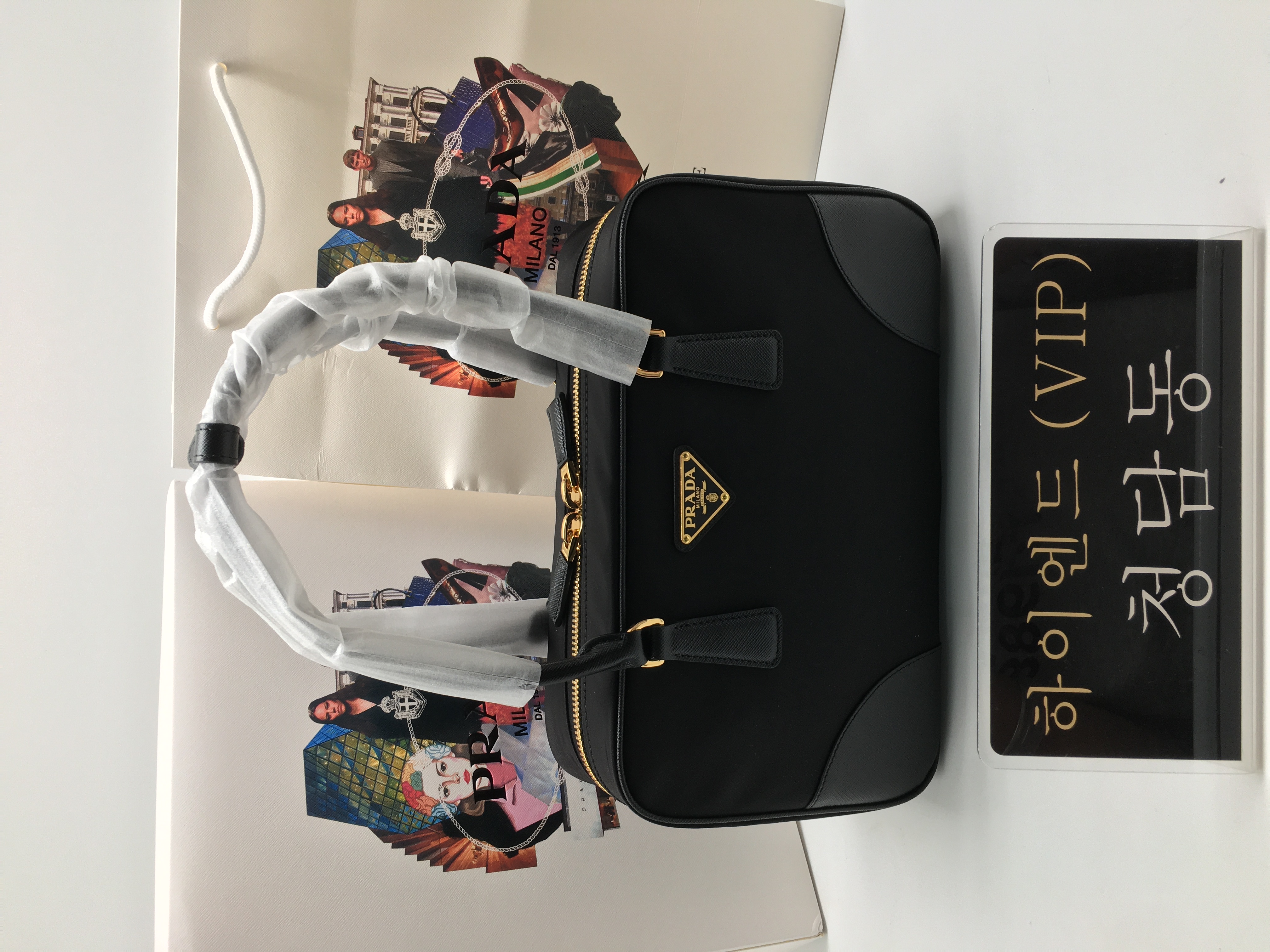 프라다 리에디션 1978 미디움 리나일론 및 사피아노 가죽 투핸들 백 1bb115