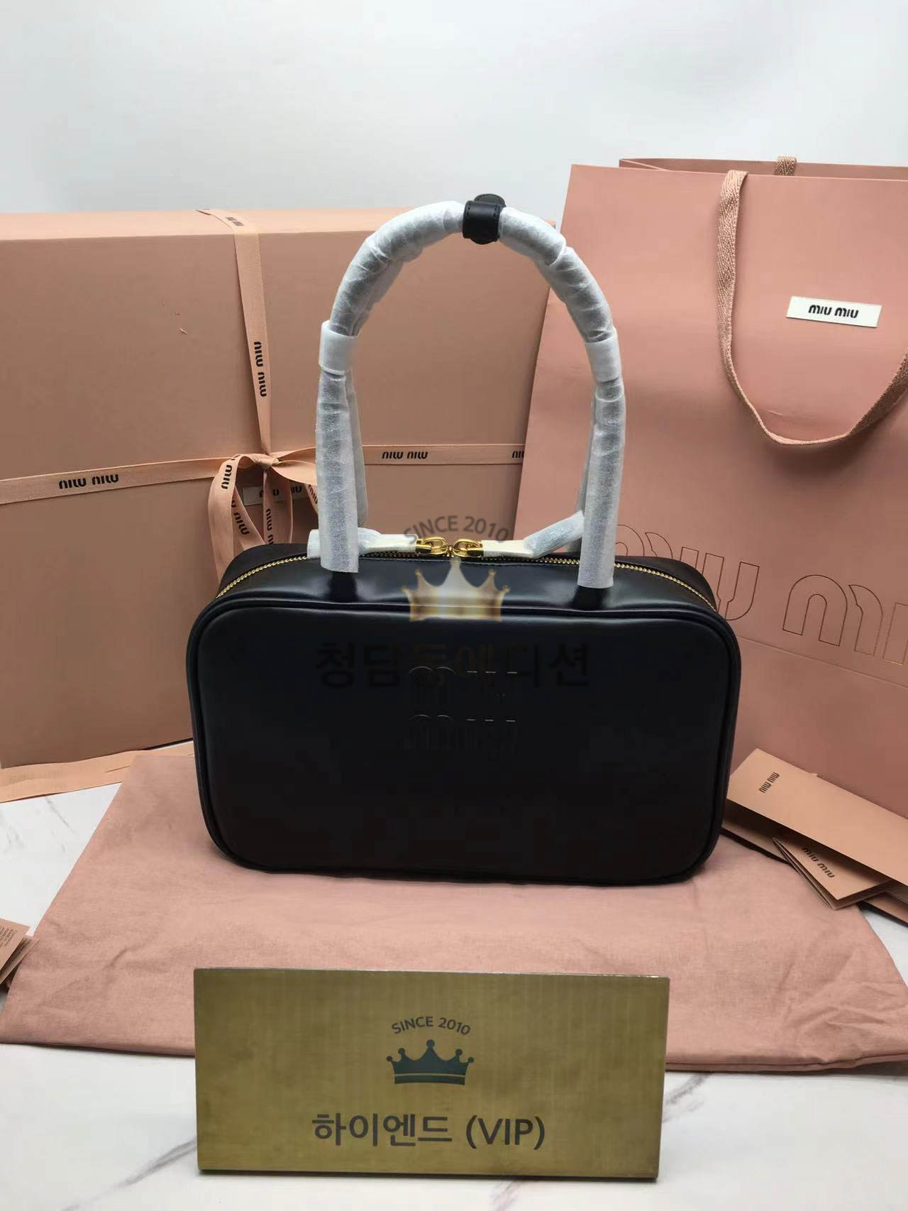 미우미우 가죽 보 백 미디움